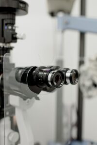 Professional medical equipment for checking refractive power of eye with protective screen in modern clinic